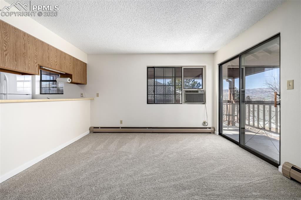 Image 4: Open Living Room with Mountain Views