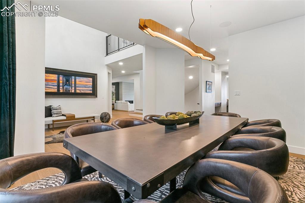 Image 3: Dining Room is open the entry and close proximity to the Kitchen