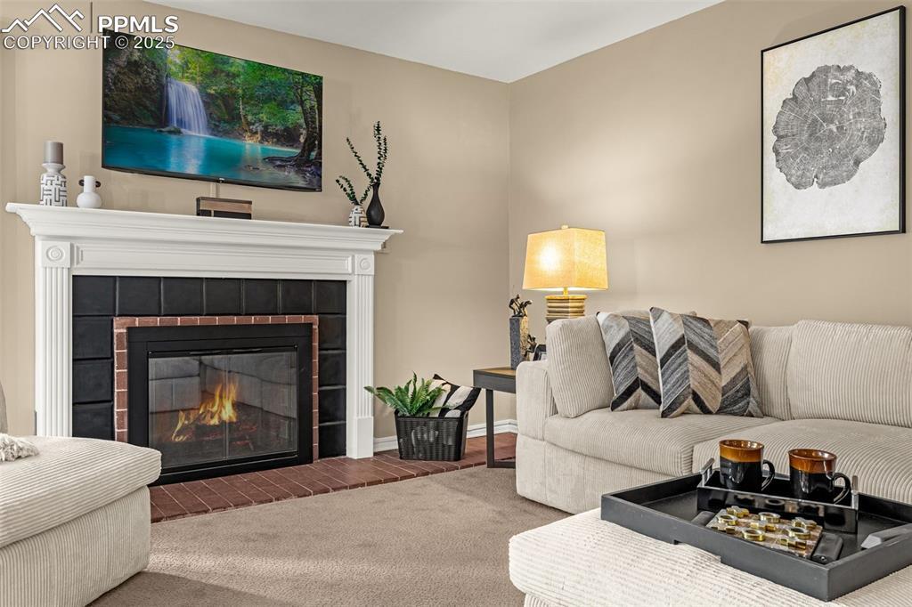 Image 3: Beautifully updated paint throughout the home; woodburning fireplace (see remarks)