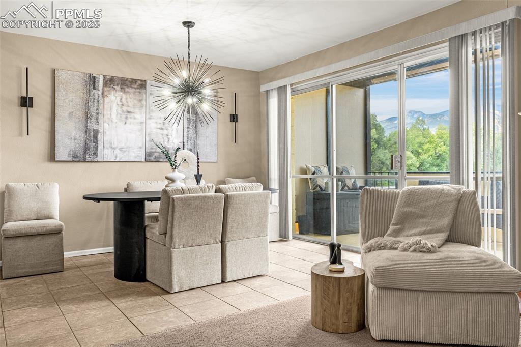 Image 4: Gorgeous mountain views while you enjoy your coffee on the balcony or from the masterfully designed dining area!