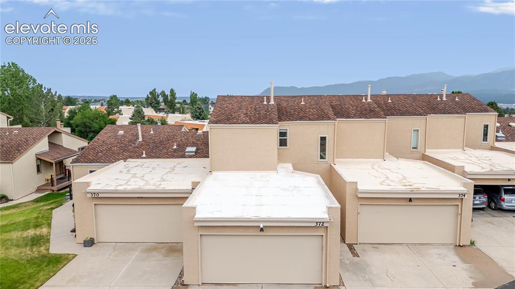 Image 2: Roof looks great but it's not your problem if it's bad. Falls on the HOA
