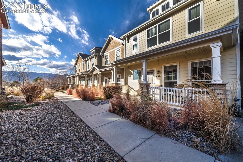 Image 2: View of property exterior featuring a porch and a mountain view