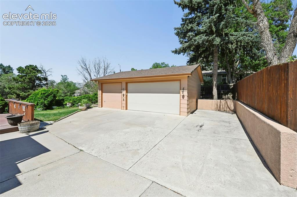 Image 3: 3 car Detached garage with RV parking