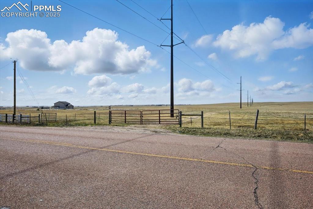 Image 3: View of street featuring a rural view
