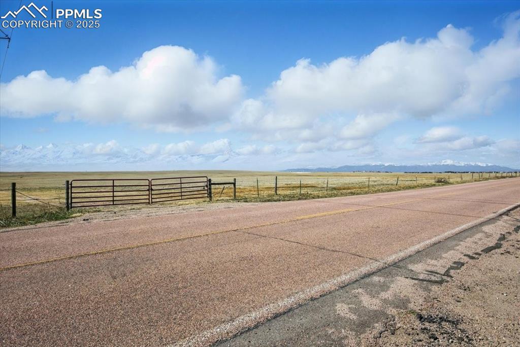 Image 4: View of street featuring a rural view