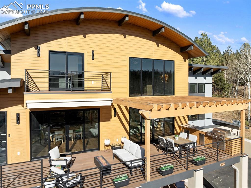 Image 3: Sunny and south facing front deck- perfect for entertaining!