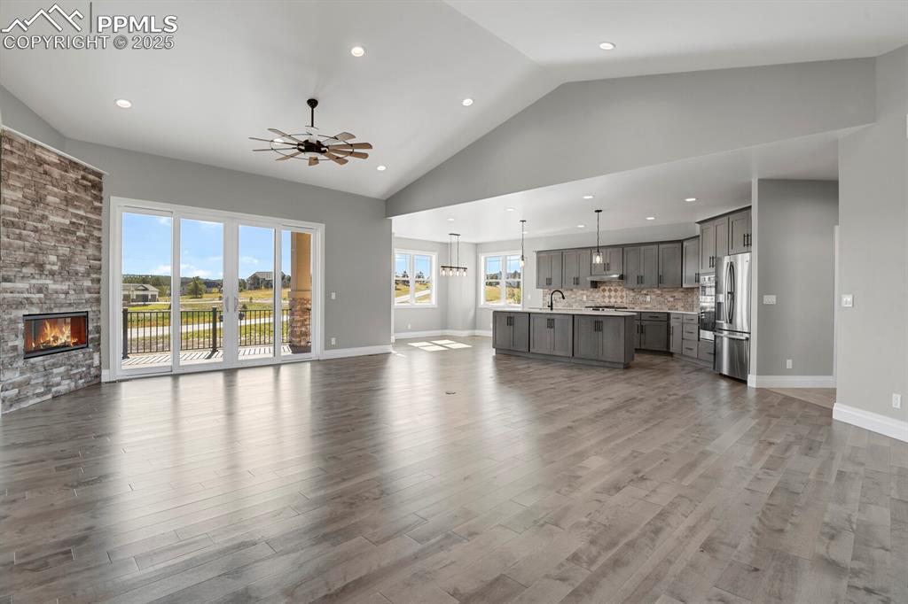 Image 3: Great room/kitchen/nook view from front door