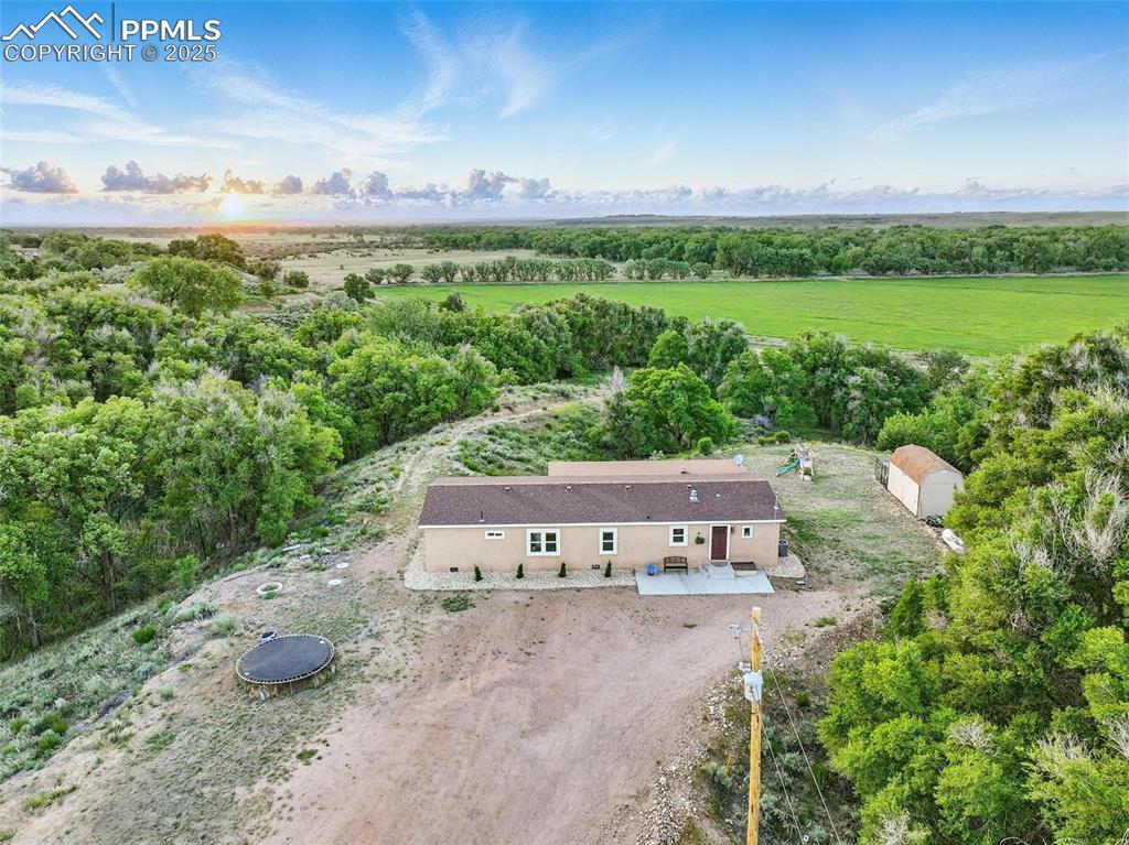 Image 1: Aerial View of front of home