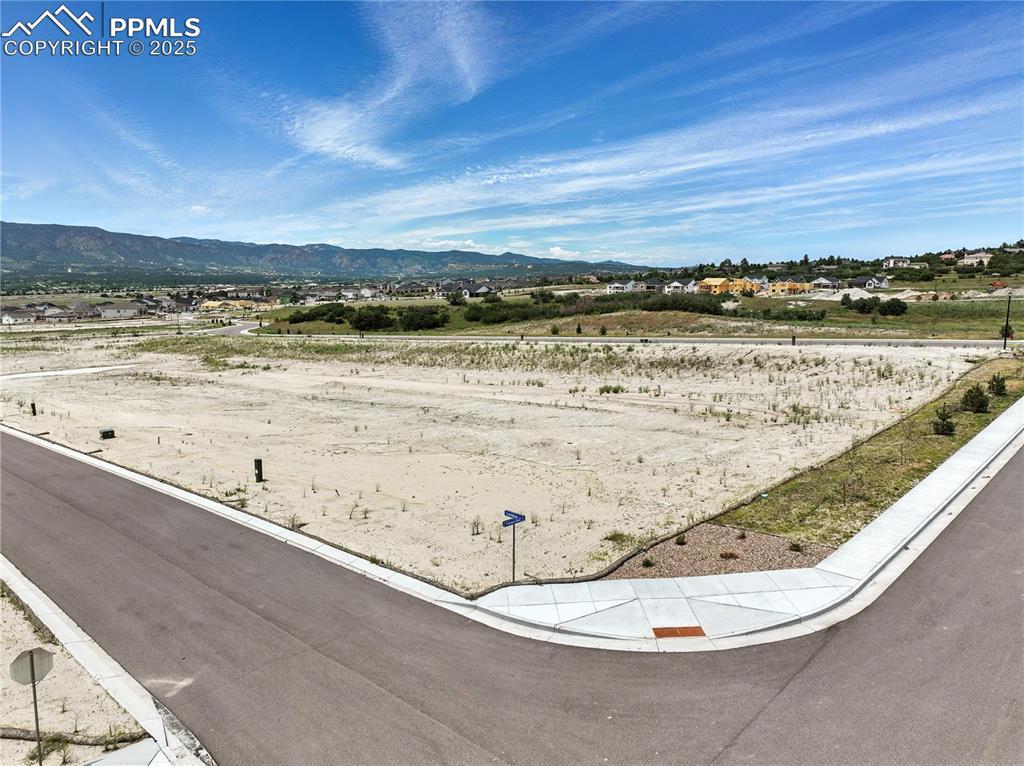 Image 4: View of mountain background with rural landscape