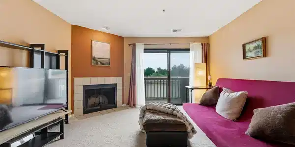 Image 4: Open floor plan flows to the balcony for outdoor living.