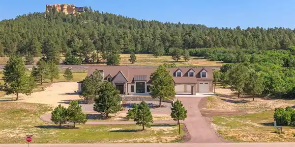 Image 2: Expansive 5 acre lot showcasing this fully custom home's private setting and surrounding natural beauty. Image 2: Expansive 5 acre lot showcasing this fully custom home's private setting and surrounding natural beauty.