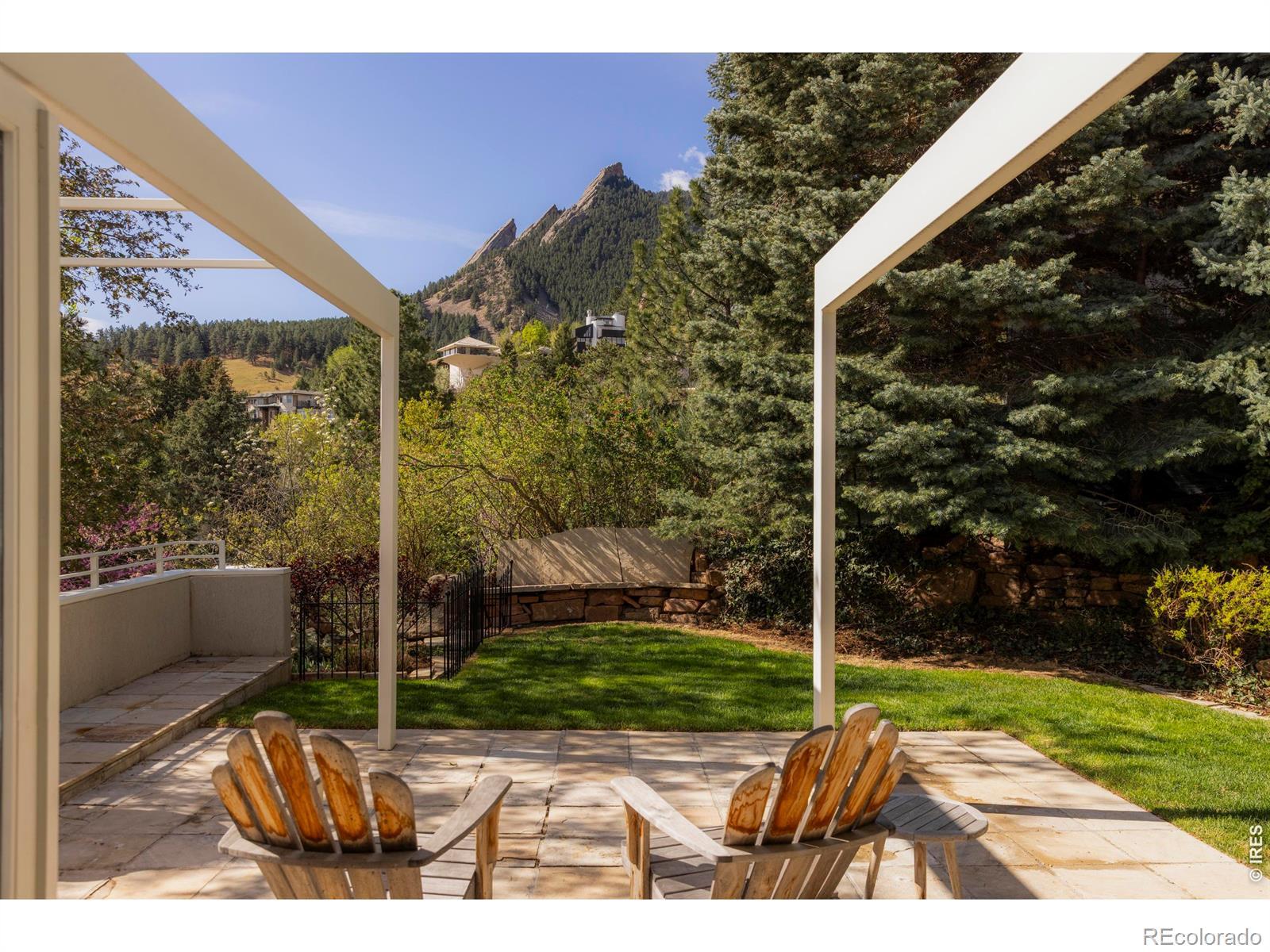 Image 2: The homes spaces orient directly toward Boulders iconic Flatirons, making the mountains a constant presence rather than a distant backdrop. The view evolves with the seasons and the hour - bathed in morning amber light, or blanketed with snow. Image 2: The homes spaces orient directly toward Boulders iconic Flatirons, making the mountains a constant presence rather than a distant backdrop. The view evolves with the seasons and the hour - bathed in morning amber light, or blanketed with snow.