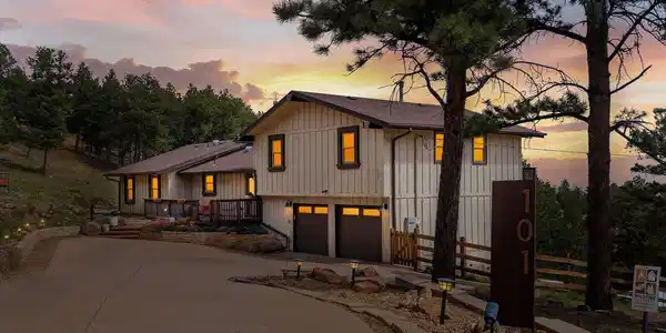Image 2: Curb appeal, mountain charm, and views to match- added bonus- a concrete driveway!