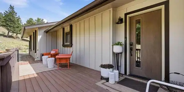 Image 3: A charming porch perfect for relaxing in every season