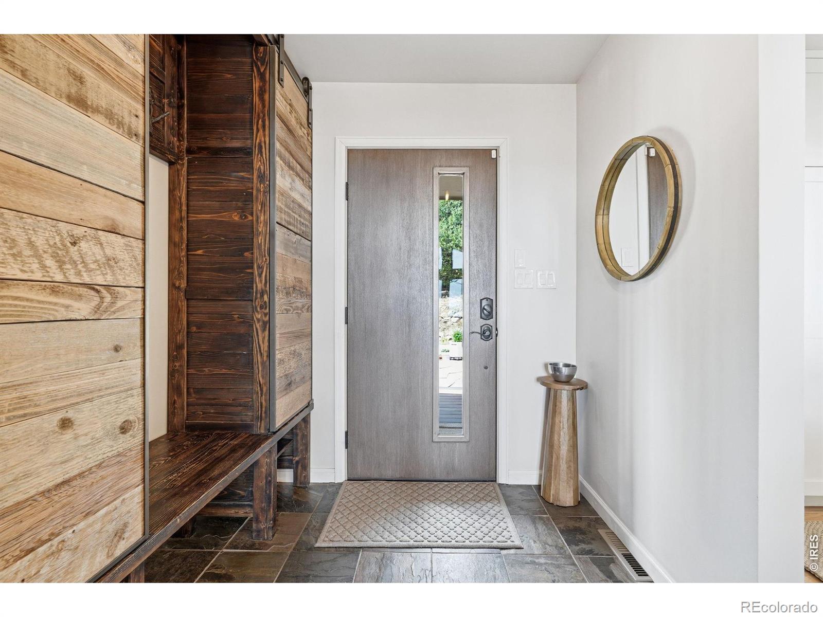 Image 4: Stylish entryway with a custom mud area for added function Image 4: Stylish entryway with a custom mud area for added function