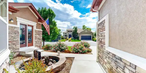 Image 2: Stunning front entry with water feature and separate entrance to work from home or multigenerational option! Image 2: Stunning front entry with water feature and separate entrance to work from home or multigenerational option!