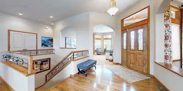 Image 4: Beautiful entry with stunning Walnut flooring on main level Image 4: Beautiful entry with stunning Walnut flooring on main level