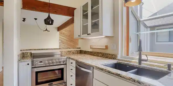 Image 4: Custom kitchen open to living/dining room Image 4: Custom kitchen open to living/dining room
