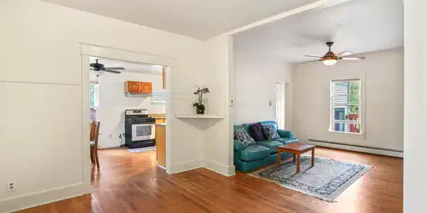 Image 3: The main level living area, with hardwood floors Image 3: The main level living area, with hardwood floors