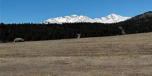 Image 3: Zoomed across the property to the Collegiate Peaks Image 3: Zoomed across the property to the Collegiate Peaks