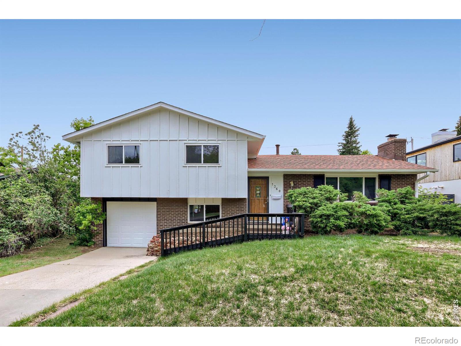 Image 3: This tri-level home, located in the popular Table Mesa neighborhood, is ready for you to make yours. Fresh paint outside and in and a new roof installed in 2025.
