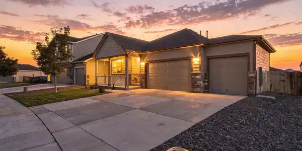 Image 4: Twilight photo of front of house