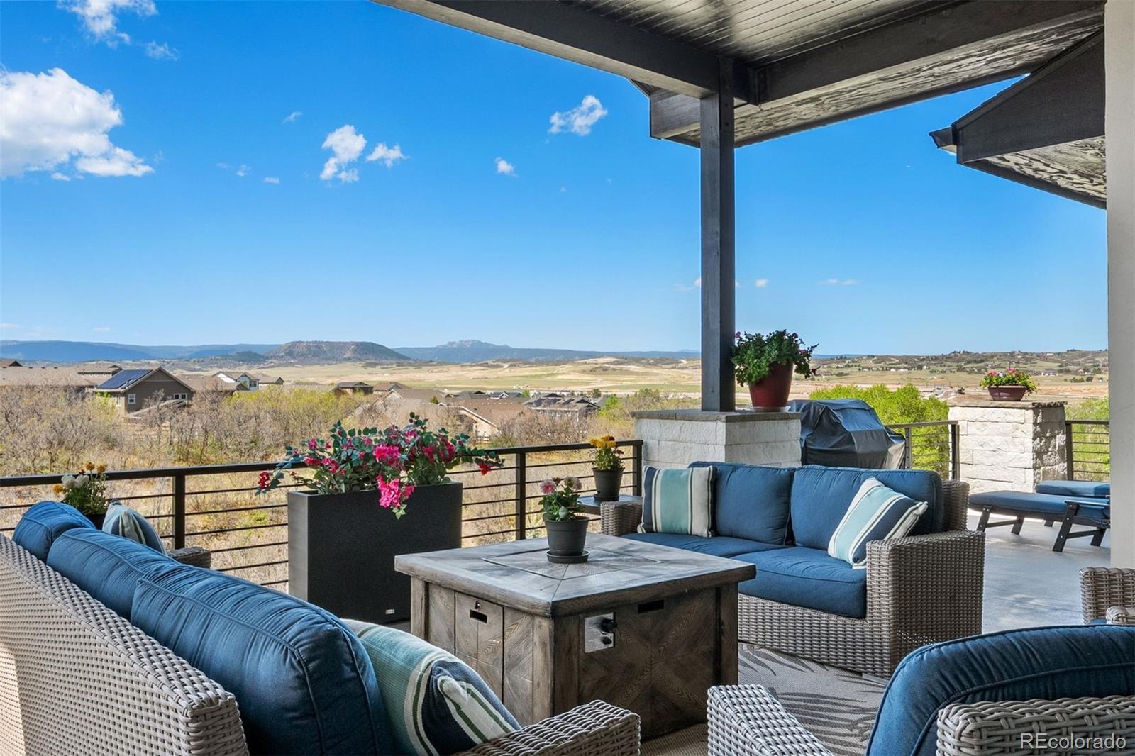 Image 3: Covered upper deck enjoys view of the mountains and green belt. Image 3: Covered upper deck enjoys view of the mountains and green belt.