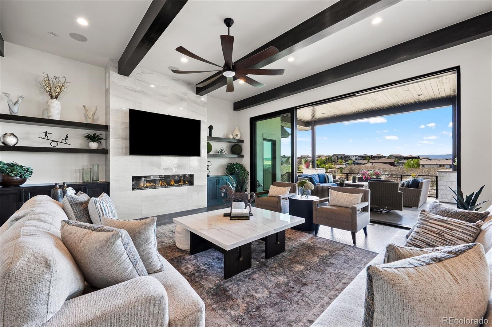 Image 4: Open great room expanded by oversized sliding glass doors to the deck. Image 4: Open great room expanded by oversized sliding glass doors to the deck.