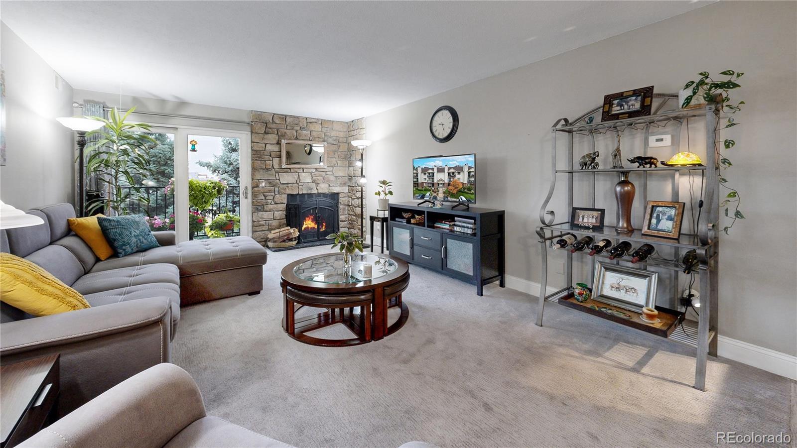 Image 2: Spacious Family Room with fireplace and access to porch