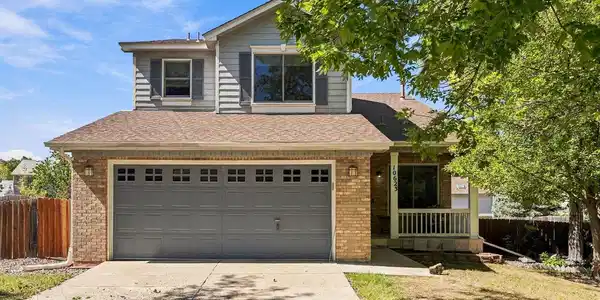 Image 3: Front view of house during the day. Image 3: Front view of house during the day.