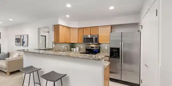 Image 2: Kitchen with available bar seating Image 2: Kitchen with available bar seating