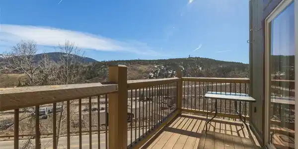 Image 2: Sunny Views from Deck