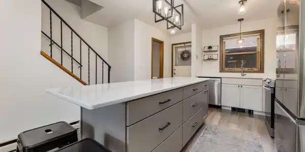 Image 2: Newly renovated kitchen with extended bar and storage Image 2: Newly renovated kitchen with extended bar and storage