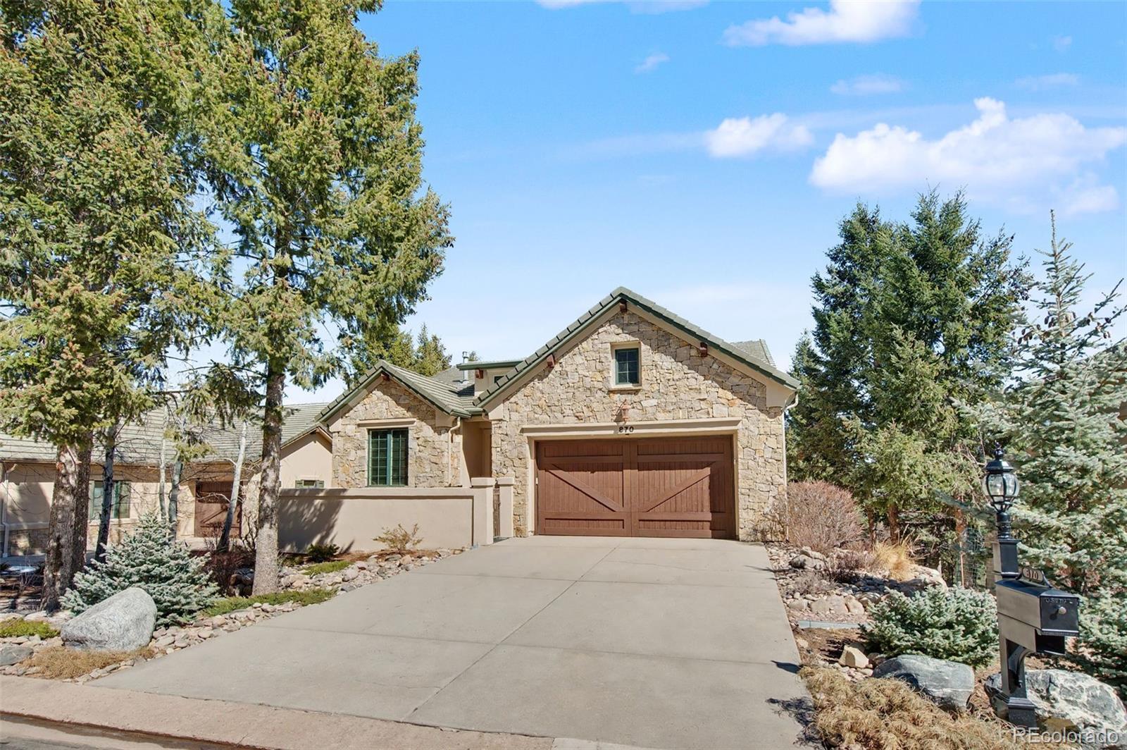 Image 2: Effortless main-level living begins the moment you pull into your spacious, attached two-car garage