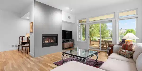 Image 3: Solid oak floors and a gas fireplace add warmth Image 3: Solid oak floors and a gas fireplace add warmth