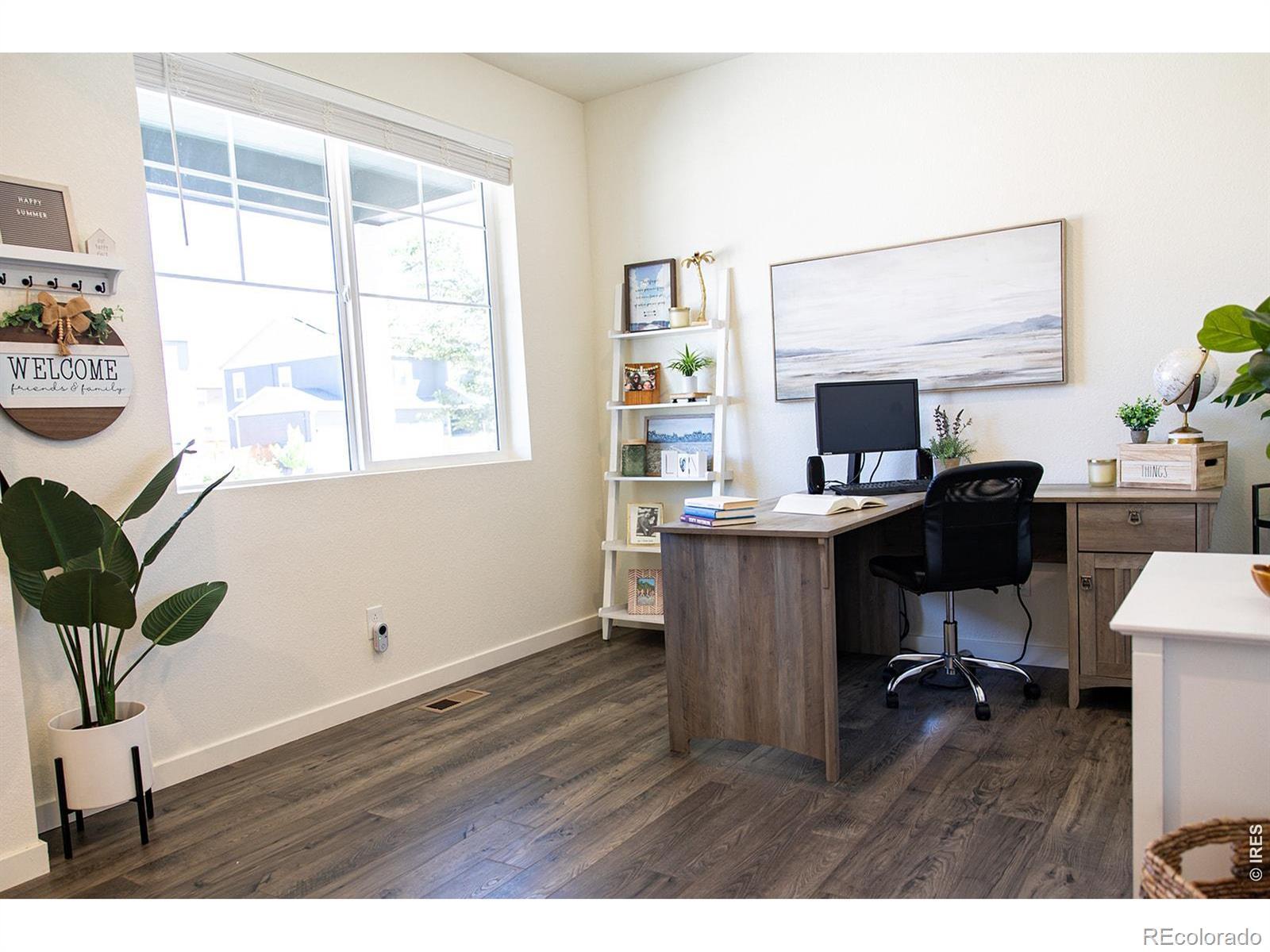 Image 4: Main Floor Flex Room: Versatile space ideal for a home office, guest suite, or main-level bedroom. Image 4: Main Floor Flex Room: Versatile space ideal for a home office, guest suite, or main-level bedroom.