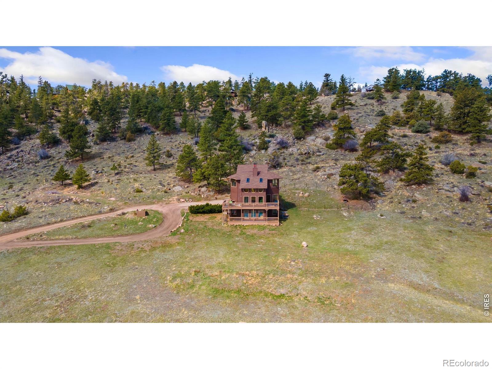 Image 2: Panoramic views from every window of this mountain home!