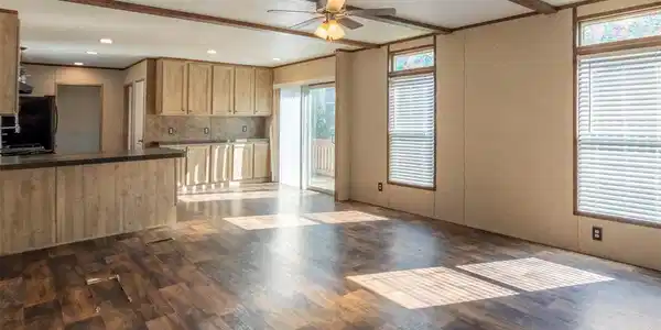 Image 3: Dining area leads into the kitchen. Image 3: Dining area leads into the kitchen.