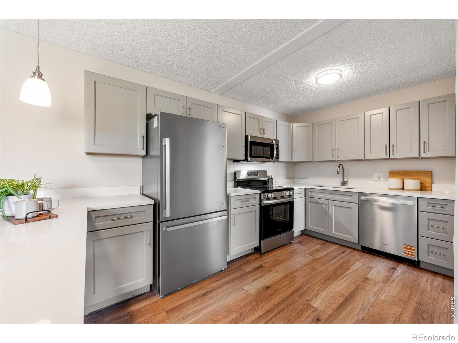 Image 1: Move-in ready condo with a functional layout, two bedrooms, and two full bathrooms