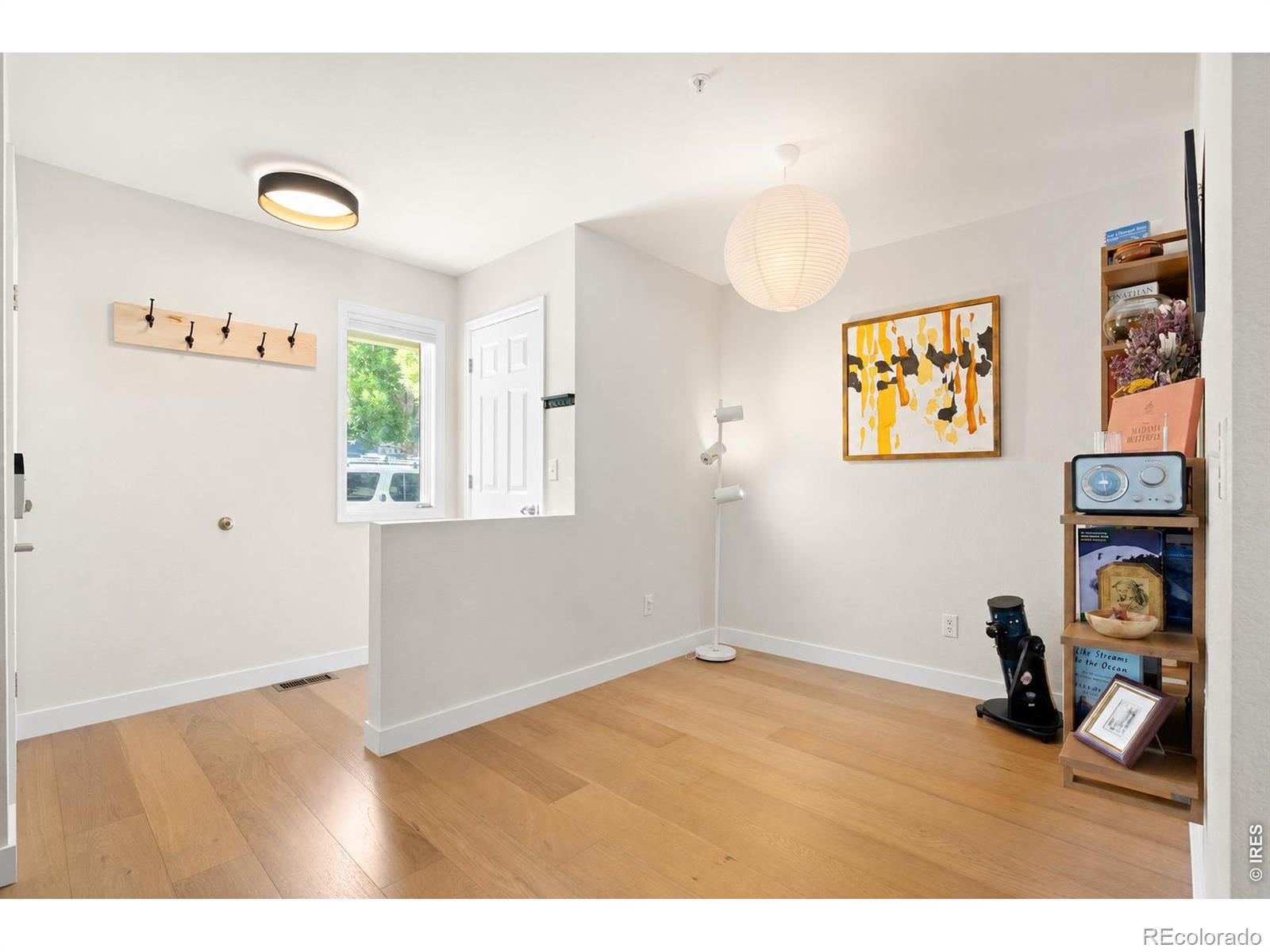 Image 4: Defined entryway with a convenient coat closet