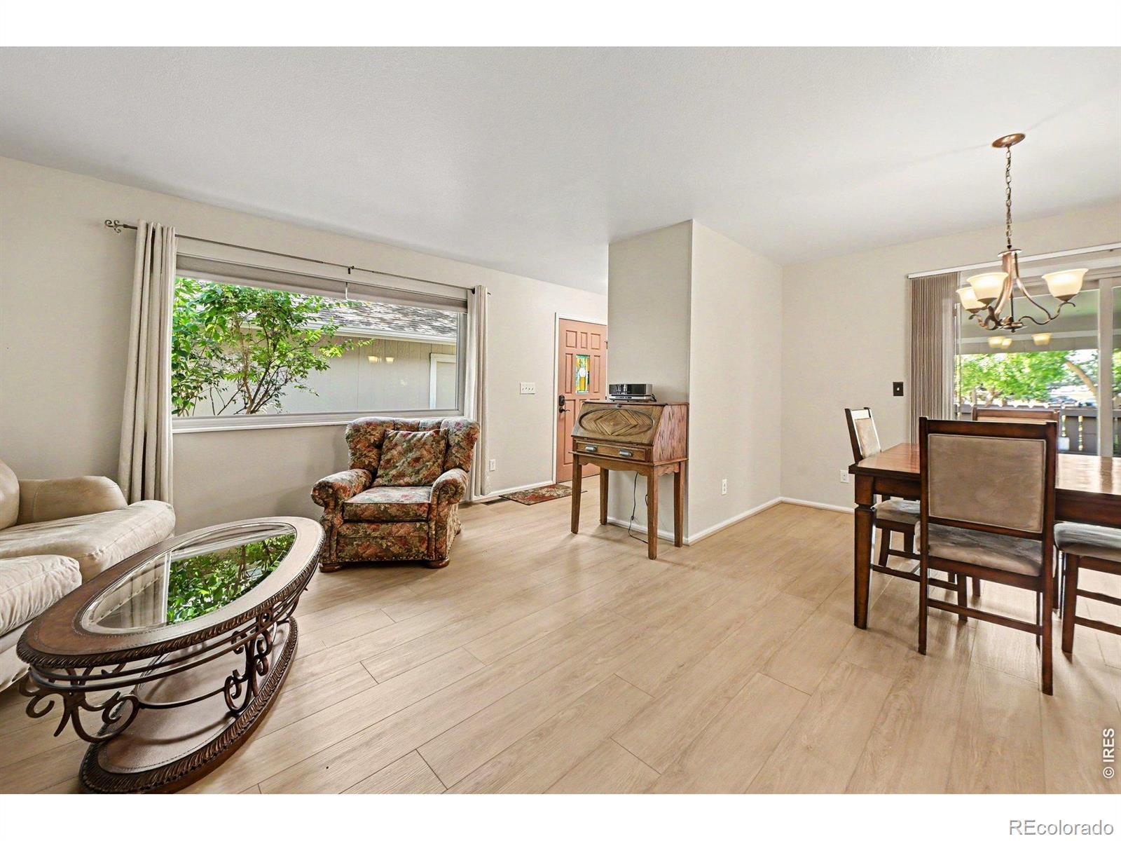 Image 4: Main level entry, living room and dining cove Image 4: Main level entry, living room and dining cove