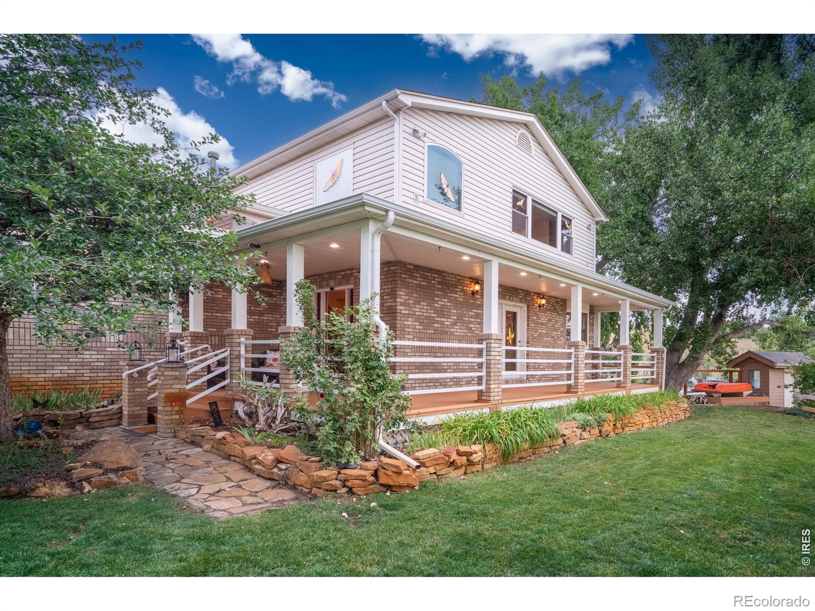 Image 2: Wrap-around covered porch and mature landscaping greet you on 10.3 acres. Image 2: Wrap-around covered porch and mature landscaping greet you on 10.3 acres.
