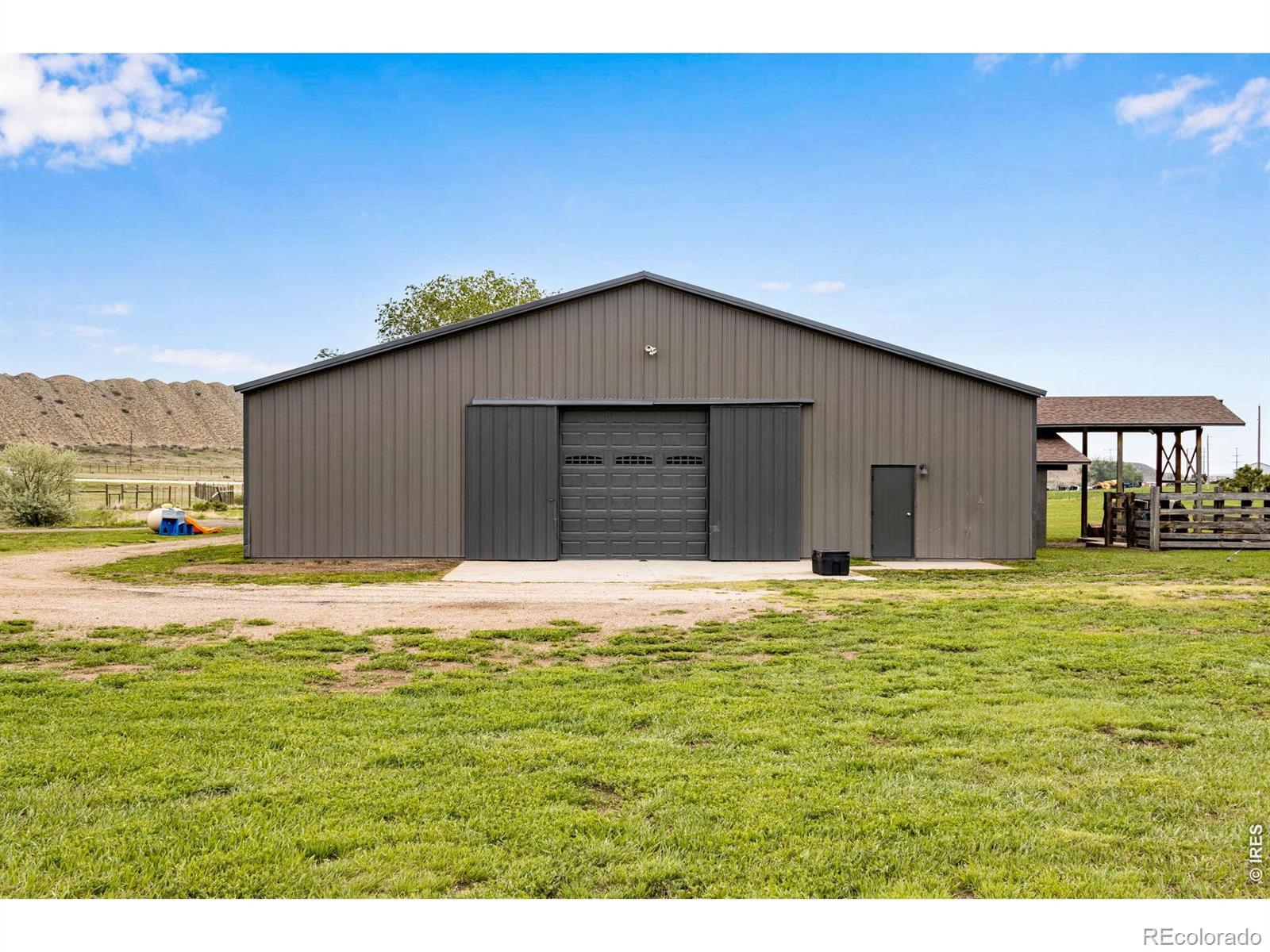 Image 4: Back of shop features a 12 X 12 overhead door. Image 4: Back of shop features a 12 X 12 overhead door.