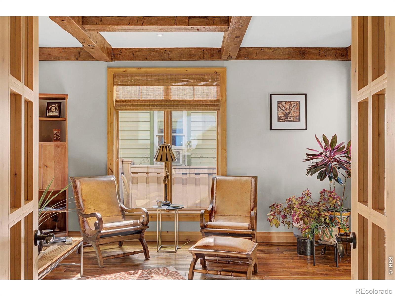 Image 4: Main level living room; could also by a 5th bedroom. Image 4: Main level living room; could also by a 5th bedroom.