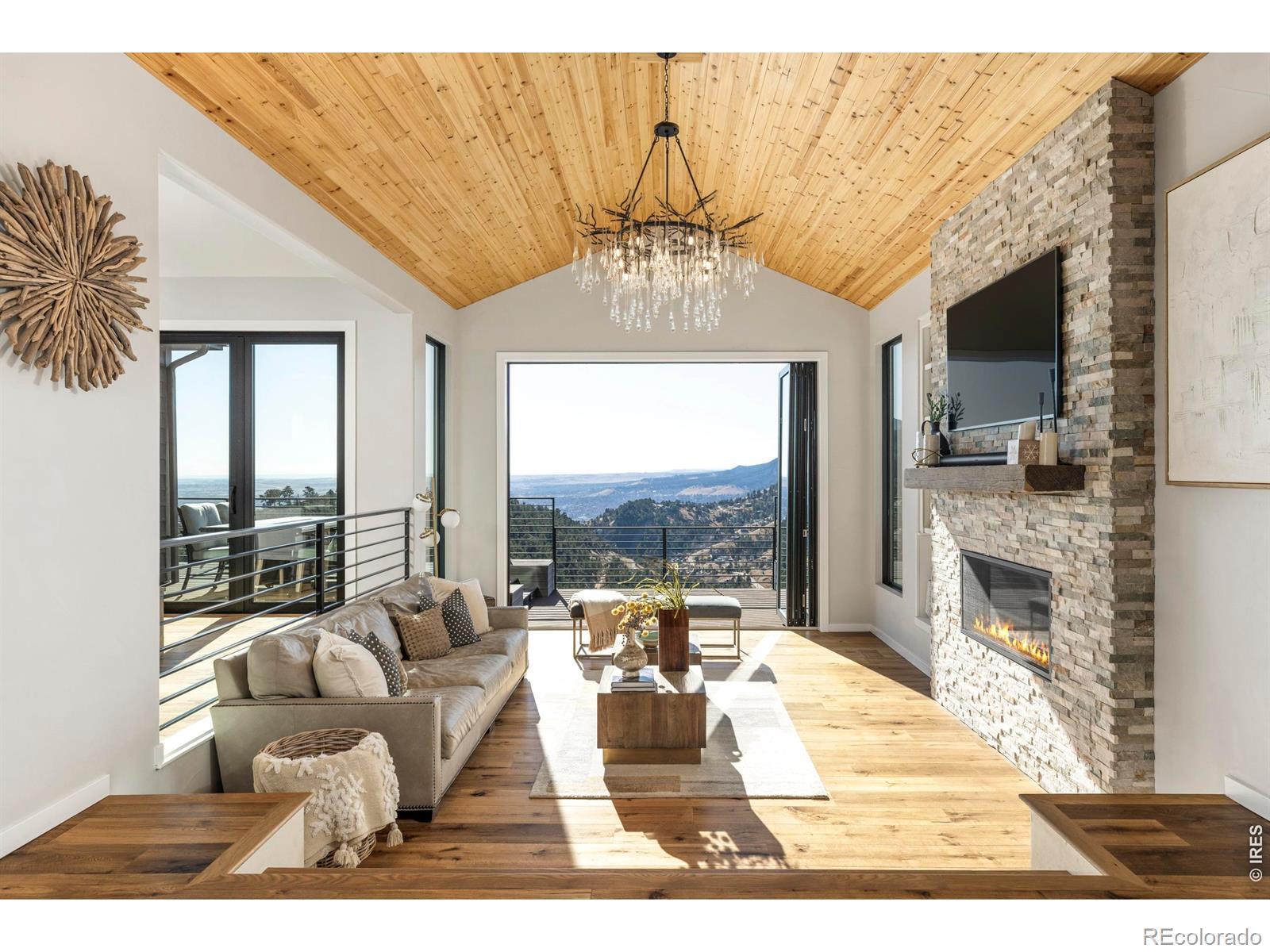 Image 1: In 2025, this home was taken through a comprehensive remodel. Soaring tongue-and-groove wood ceilings, 7" hardwood floors, custom tile, all-new Pella windows, automated blinds, and skylights flood the home with light. Image 1: In 2025, this home was taken through a comprehensive remodel. Soaring tongue-and-groove wood ceilings, 7" hardwood floors, custom tile, all-new Pella windows, automated blinds, and skylights flood the home with light.