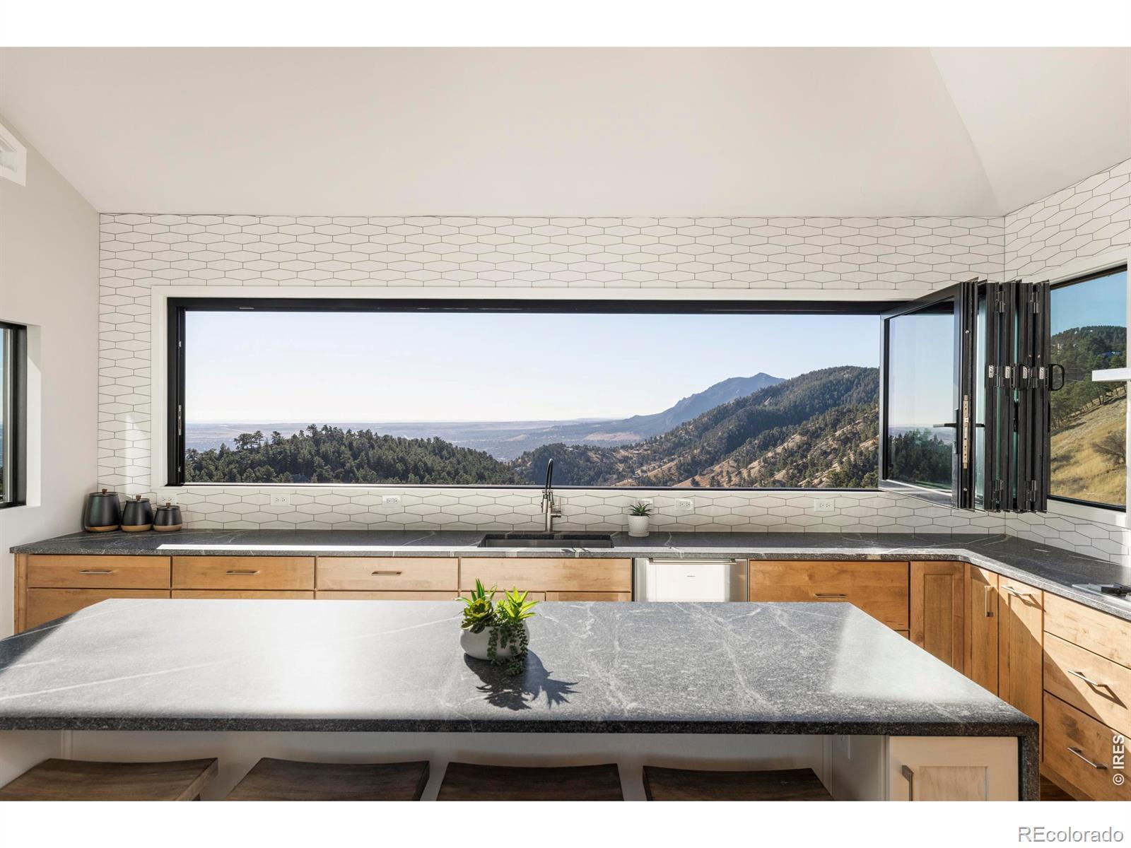 Image 2: The 16 window above the kitchen sink opens entirely, bringing mountain air directly into the heart of the home. Image 2: The 16 window above the kitchen sink opens entirely, bringing mountain air directly into the heart of the home.