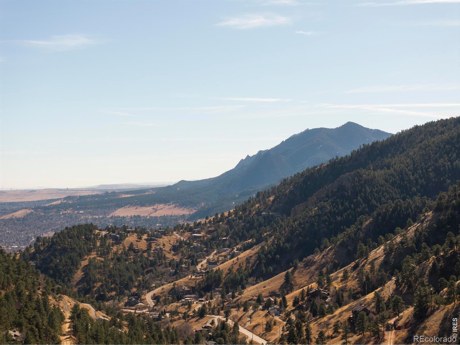 Image 3: The Flatirons fill the southern view, Boulder spreads across the valley below, and Open Space trails begin steps from your door. Image 3: The Flatirons fill the southern view, Boulder spreads across the valley below, and Open Space trails begin steps from your door.
