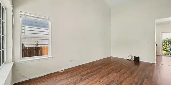 Image 3: Laminated wood floors throughout main level Image 3: Laminated wood floors throughout main level