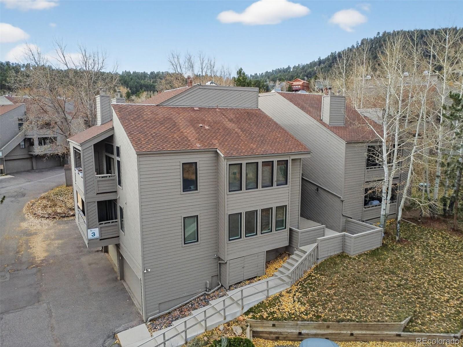 Image 2: Top-floor corner unit tucked in a serene Genesee Village cul-de-sac surrounded by trees and foothill views. Image 2: Top-floor corner unit tucked in a serene Genesee Village cul-de-sac surrounded by trees and foothill views.
