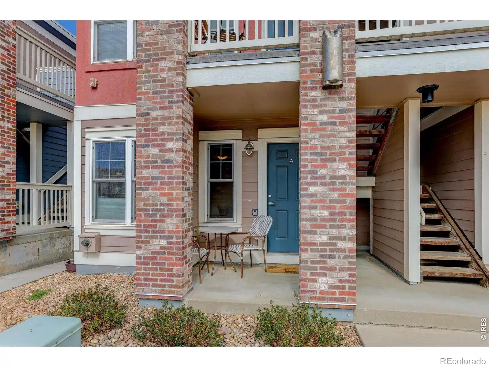 Image 1: Blue door, END Unit! Walk along the side of the house to get to your carport-behind unit. Image 1: Blue door, END Unit! Walk along the side of the house to get to your carport-behind unit.